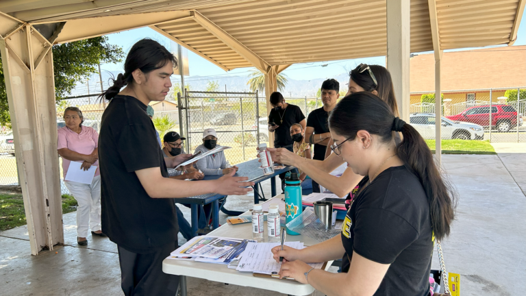 Organizers tabling for event in the Eastern Coachella Valley
