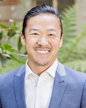 A headshot of Quade French